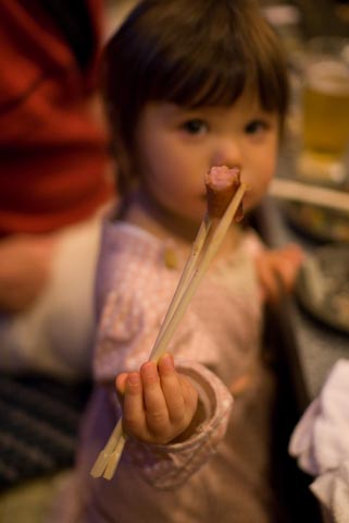 Nikon D200 + Sigma 30mm f/1.4 &mdash; 1 / 80 sec, f/1.4, ISO 640 &mdash; map & image data Two-year-old using chopsticks -- Kyoto, Japan -- Copyright 2007 Jeffrey Eric Francis Friedl, http://regex.info/blog/