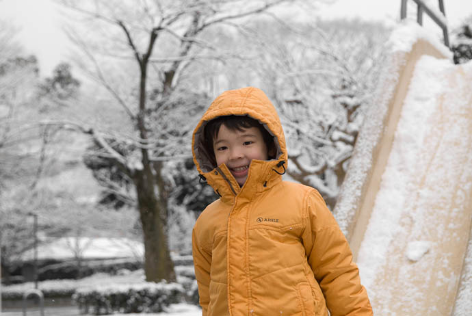 pleased at having destroyed the virgin snow, grinning like a Cheshire Cat -- Kyoto, Japan -- Copyright 2008 Jeffrey Eric Francis Friedl