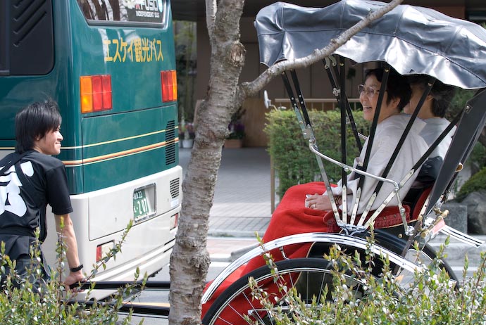 Some Found Ways To Enjoy Despite the Traffic Rickshaw Ride in Kyoto, Japan -- Copyright 2008 Jeffrey Eric Francis Friedl
