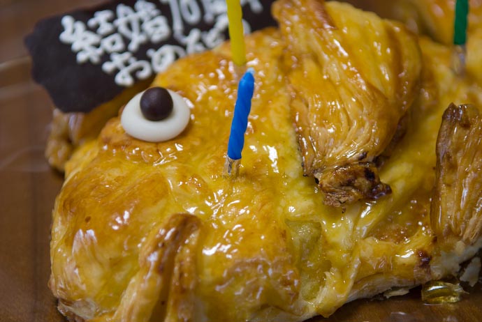 Sea-Bream-Shaped Apple Pie The chocolate &#8220;card&#8221; on its dorsal fin says &#8220; Happy 10 th Wedding Anniversary&#8221; -- Kyoto, Japan -- Copyright 2008 Jeffrey Eric Francis Friedl, http://regex.info/blog/