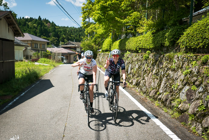 Quintessentially Japanese ( the &#8220; peace &#8221; signs ) taken while cycling at 15 kph (9 mph) -- Kyoto, Japan -- Copyright 2015 Jeffrey Friedl, http://regex.info/blog/