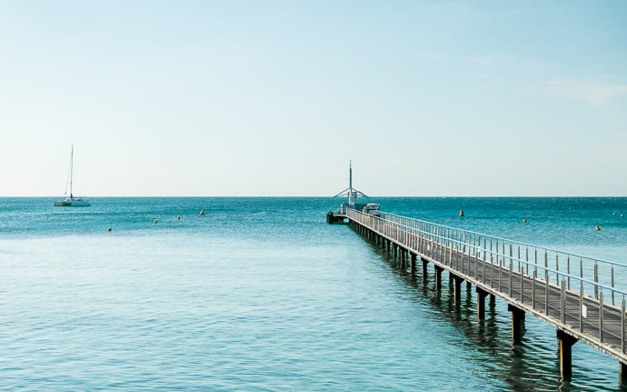 desktop background image of the boat dock at Îlot Maître (メトル島), New Caledonia -- Îlot Maître (メトル島), New Caledonia -- Îlot Maître (メトル島) -- Nouméa, South, New Caledonia -- Copyright 2015 Jeffrey Friedl, http://regex.info/blog/ -- This photo is licensed to the public under the Creative Commons Attribution-NonCommercial 4.0 International License http://creativecommons.org/licenses/by-nc/4.0/ (non-commercial use is freely allowed if proper attribution is given, including a link back to this page on http://regex.info/ when used online)