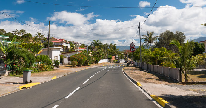 Suburban Nouméa not suburban Socal taken while cycling at 37 kph (23 mph) -- Nouméa, South, New Caledonia -- Copyright 2015 Jeffrey Friedl, http://regex.info/blog/ -- This photo is licensed to the public under the Creative Commons Attribution-NonCommercial 4.0 International License http://creativecommons.org/licenses/by-nc/4.0/ (non-commercial use is freely allowed if proper attribution is given, including a link back to this page on http://regex.info/ when used online)