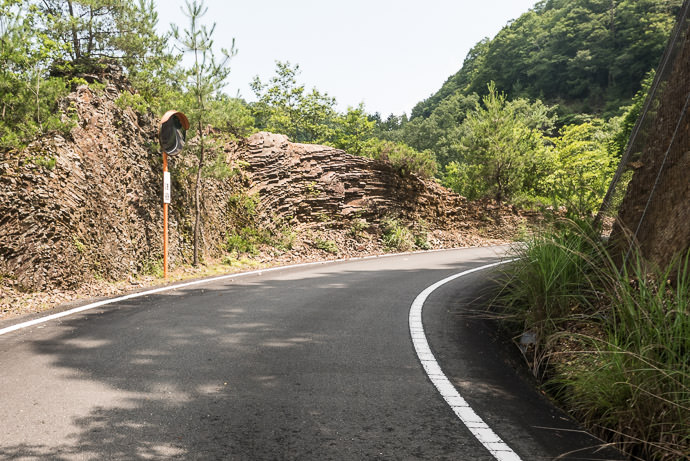 Road Slicing Through Rock the beauty of the construction often complimented the beauty of the nature it passed through -- Funai-gun -- Funai-gun, Kyoto, Japan -- Copyright 2016 Jeffrey Friedl, http://regex.info/blog/