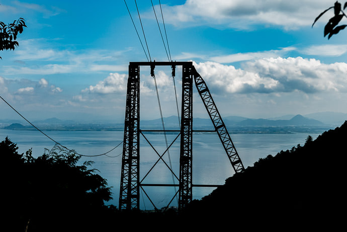View Past the Support Mast for the old cable car -- Otsu, Shiga, Japan -- Copyright 2016 Jeffrey Friedl, http://regex.info/blog/ -- This photo is licensed to the public under the Creative Commons Attribution-NonCommercial 4.0 International License http://creativecommons.org/licenses/by-nc/4.0/ (non-commercial use is freely allowed if proper attribution is given, including a link back to this page on http://regex.info/ when used online)