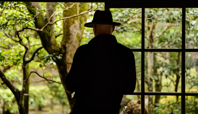 In Silhouette doing a fedora right -- Honen'in Temple (法然院) -- Kyoto, Japan -- Copyright 2012 Jeffrey Friedl, http://regex.info/blog/ -- This photo is licensed to the public under the Creative Commons Attribution-NonCommercial 3.0 Unported License http://creativecommons.org/licenses/by-nc/3.0/ (non-commercial use is freely allowed if proper attribution is given, including a link back to this page on http://regex.info/ when used online)