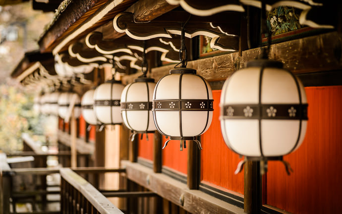 desktop background image of lanterns hanging at the Kitano Tenmangu Shrine (北野天満宮), Kyoto Japan -- Lanterns -- Kitano Tenmangu Shrine (北野天満宮) -- Copyright 2013 Jeffrey Friedl, http://regex.info/blog/ -- This photo is licensed to the public under the Creative Commons Attribution-NonCommercial 4.0 International License http://creativecommons.org/licenses/by-nc/4.0/ (non-commercial use is freely allowed if proper attribution is given, including a link back to this page on http://regex.info/ when used online)