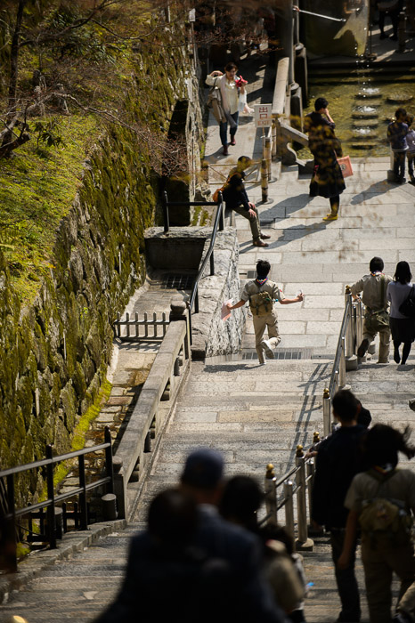 Kids Being Kids some Boy Scouts jaunt down the steps -- Kiyomizu Temple (清水寺) -- Kyoto, Japan -- Copyright 2013 Jeffrey Friedl, http://regex.info/blog/ -- This photo is licensed to the public under the Creative Commons Attribution-NonCommercial 3.0 Unported License http://creativecommons.org/licenses/by-nc/3.0/ (non-commercial use is freely allowed if proper attribution is given, including a link back to this page on http://regex.info/ when used online)