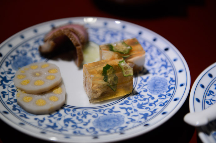Assorted mustard & renkon , beef, okura and chicken(?) -- Nagasaki, Japan -- Copyright 2013 Jeffrey Friedl, http://regex.info/blog/