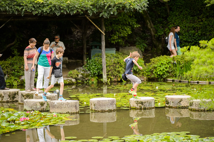 Kids being kids -- Heian Shrine (平安神宮) -- Kyoto, Japan -- Copyright 2013 Jeffrey Friedl, http://regex.info/blog/ -- This photo is licensed to the public under the Creative Commons Attribution-NonCommercial 3.0 Unported License http://creativecommons.org/licenses/by-nc/3.0/ (non-commercial use is freely allowed if proper attribution is given, including a link back to this page on http://regex.info/ when used online)