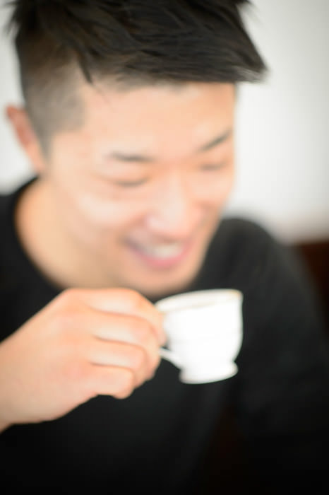 Pure Enjoyment my friend Kataoka-san enjoying his teeny tiny baby-cup of espresso at Restaurant La Verveine , Kyoto Japan -- Copyright 2013 Jeffrey Friedl, http://regex.info/blog/