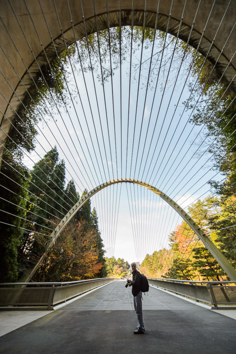 Too-Tall Paul distorted by the fisheye lens -- Miho Museum (ミホミュージアム) -- Koka, Shiga, Japan -- Copyright 2013 Jeffrey Friedl, http://regex.info/blog/ -- This photo is licensed to the public under the Creative Commons Attribution-NonCommercial 4.0 International License http://creativecommons.org/licenses/by-nc/4.0/ (non-commercial use is freely allowed if proper attribution is given, including a link back to this page on http://regex.info/ when used online)