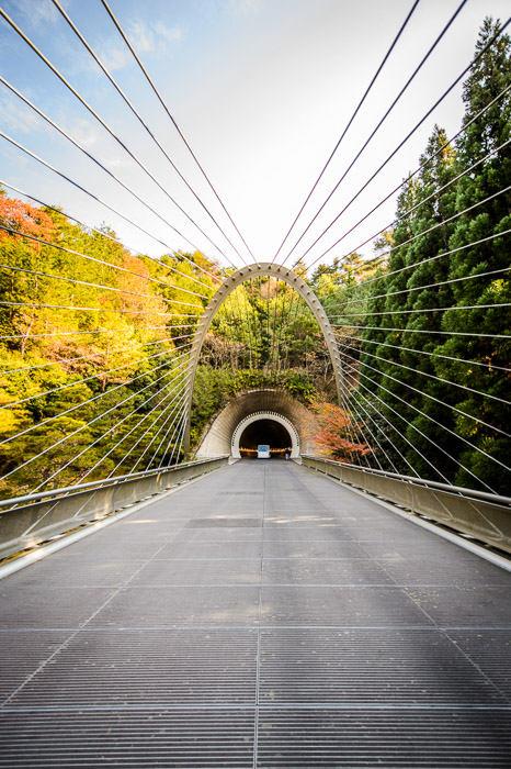 Looking Back from the middle of the bridge back to the tunnel I'm probably the first person ever to take this shot. Same for all of these shots. -- Miho Museum (ミホミュージアム) -- Koka, Shiga, Japan -- Copyright 2013 Jeffrey Friedl, http://regex.info/blog/ -- This photo is licensed to the public under the Creative Commons Attribution-NonCommercial 3.0 Unported License http://creativecommons.org/licenses/by-nc/3.0/ (non-commercial use is freely allowed if proper attribution is given, including a link back to this page on http://regex.info/ when used online)