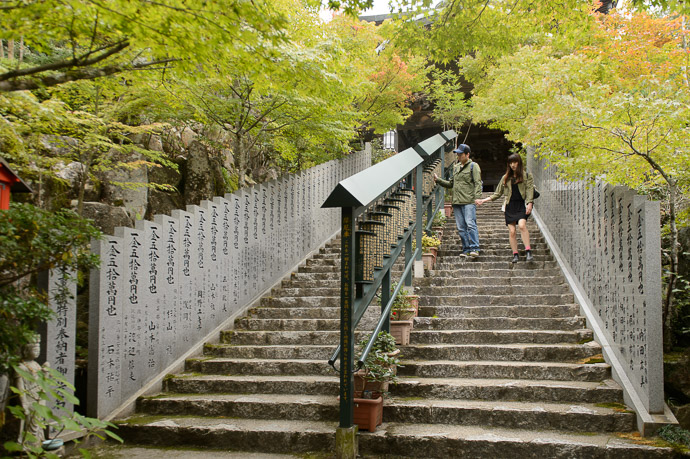 Prayer Wheels (摩尼車) steps leading to Daishoin Temple's Maniden Hall (大聖院 の 摩尼殿) -- Daishoin Temple's Maniden Hall (大聖院の摩尼殿) -- Miyajima, Hiroshima, Japan -- Copyright 2014 Jeffrey Friedl, http://regex.info/blog/ -- This photo is licensed to the public under the Creative Commons Attribution-NonCommercial 4.0 International License http://creativecommons.org/licenses/by-nc/4.0/ (non-commercial use is freely allowed if proper attribution is given, including a link back to this page on http://regex.info/ when used online)