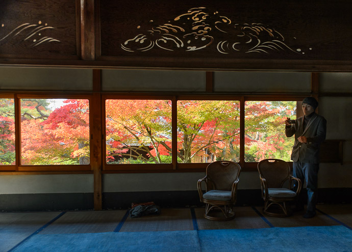 Oppressive Crowd this guy stood in my way for 10, possibly 15 seconds! -- Shodensanso Villa (松殿山荘) -- Kyoto, Japan -- Copyright 2014 Jeffrey Friedl, http://regex.info/blog/ -- This photo is licensed to the public under the Creative Commons Attribution-NonCommercial 4.0 International License http://creativecommons.org/licenses/by-nc/4.0/ (non-commercial use is freely allowed if proper attribution is given, including a link back to this page on http://regex.info/ when used online)