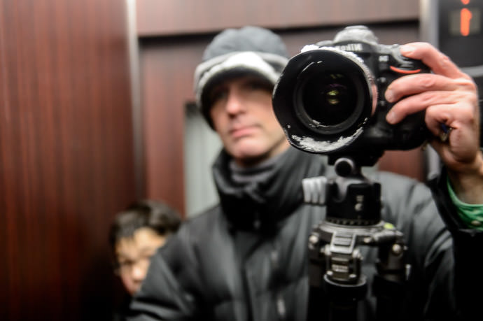 Impromptu Elevator Selfie with both camera and self slightly snow encrusted -- Shirakawa River -- Kyoto, Japan -- Copyright 2015 Jeffrey Friedl, http://regex.info/blog/ -- This photo is licensed to the public under the Creative Commons Attribution-NonCommercial 4.0 International License http://creativecommons.org/licenses/by-nc/4.0/ (non-commercial use is freely allowed if proper attribution is given, including a link back to this page on http://regex.info/ when used online)