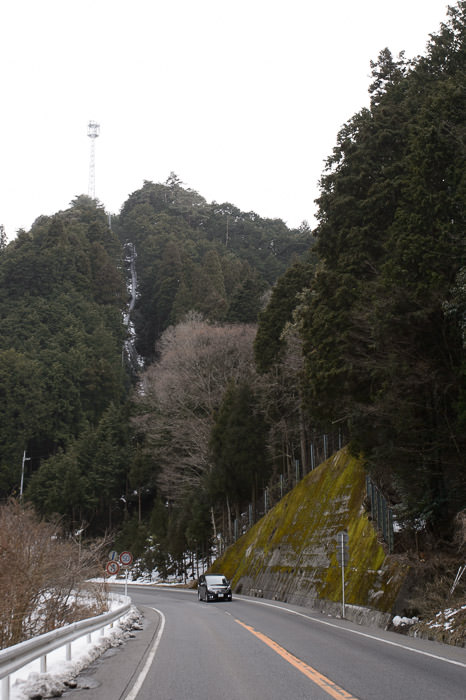 Kyoto's &#8220; I Fall &#8221; Tower and its flight of 308 steps 2:45pm (68.6km), taken one-handed while cycling at 50 km/h -- Otsu, Shiga, Japan -- Copyright 2015 Jeffrey Friedl, http://regex.info/blog/ -- This photo is licensed to the public under the Creative Commons Attribution-NonCommercial 4.0 International License http://creativecommons.org/licenses/by-nc/4.0/ (non-commercial use is freely allowed if proper attribution is given, including a link back to this page on http://regex.info/ when used online)