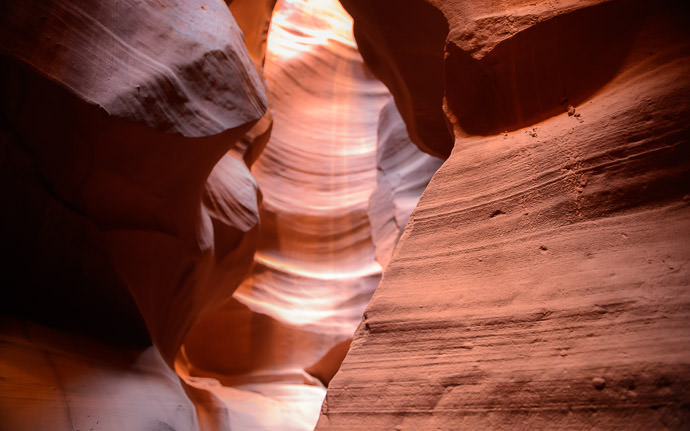 desktop background image of wavy rocks at Antelope Canyon, on Navajo land near Page Arizona. -- Wall Detail but I really wish I had my Voigtländer 125mm f/2.5 for its close-up sharpness -- Page, Arizona, United States -- Copyright 2015 Jeffrey Friedl, http://regex.info/blog/ -- This photo is licensed to the public under the Creative Commons Attribution-NonCommercial 4.0 International License http://creativecommons.org/licenses/by-nc/4.0/ (non-commercial use is freely allowed if proper attribution is given, including a link back to this page on http://regex.info/ when used online)