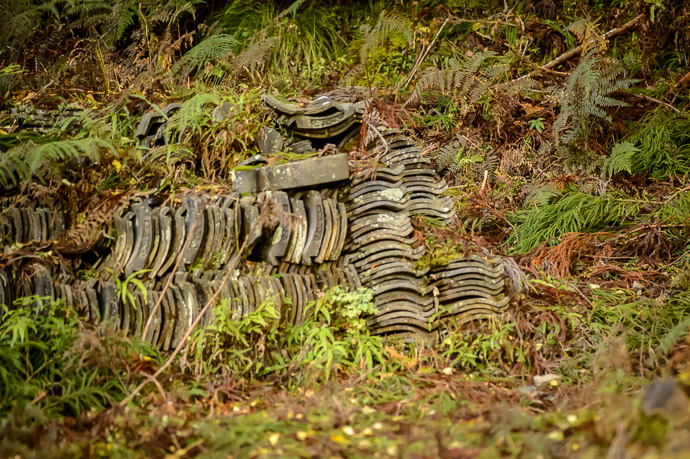 Old Roof Tiles discarded off to one side -- Kyoto, Japan -- Copyright 2017 Jeffrey Friedl, http://regex.info/blog/ -- This photo is licensed to the public under the Creative Commons Attribution-NonCommercial 4.0 International License http://creativecommons.org/licenses/by-nc/4.0/ (non-commercial use is freely allowed if proper attribution is given, including a link back to this page on http://regex.info/ when used online)