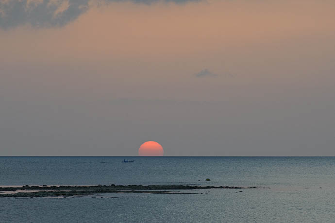 Mild Sunset and Clich&eacute; Boat From the Fusaki Resort Village Beach, Ishigaki Island, Japan -- Ishigaki, Okinawa, Japan -- Copyright 2009 Jeffrey Friedl, http://regex.info/blog/