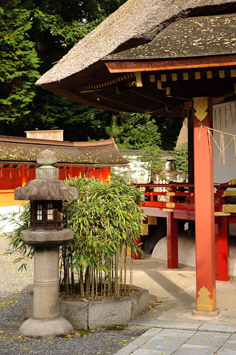 Lantern, Planter, and Thatched Roof -- Yoshida Shrine -- Kyoto, Japan -- Copyright 2009 Jeffrey Friedl, http://regex.info/blog/