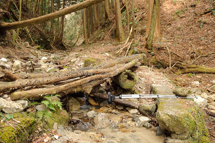 $240 Audio Recorder suspended over a stream by a $9 tripod and a rock Mountains north of the Kitashirakawa area of Kyoto, Japan -- Small mountain stream in the Kitashirakawa area of Kyoto -- Copyright 2010 Jeffrey Friedl, http://regex.info/blog/