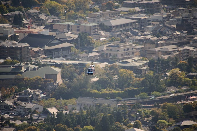 four seconds later, Helicopter at 500mm ( you've just got to love the convenience of a 10x superzoom ) -- Kyoto, Japan -- Copyright 2010 Jeffrey Friedl, http://regex.info/blog/