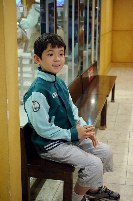 Waiting for his Shift to Start for a long day of appliance repair -- KidZania -- Nishinomiya, Hyogo, Japan -- Copyright 2010 Jeffrey Friedl, http://regex.info/blog/