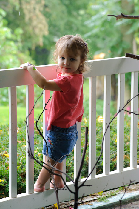 Today's Guest Reviewer 23-month-old Jena Kreta watching a sudden downpour this morning -- Rootstown, OH, USA -- Copyright 2010 Jeffrey Friedl, http://regex.info/blog/