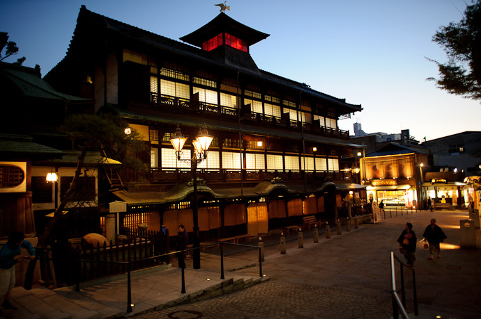 Main Building at the Dougo Onsen with the &#8220;Tama no Ishi&#8221; (玉の石) in the lower left -- Dougo Onsen (道後温泉) -- Matsuyama, Ehime, Japan -- Copyright 2011 Jeffrey Friedl, http://regex.info/blog/