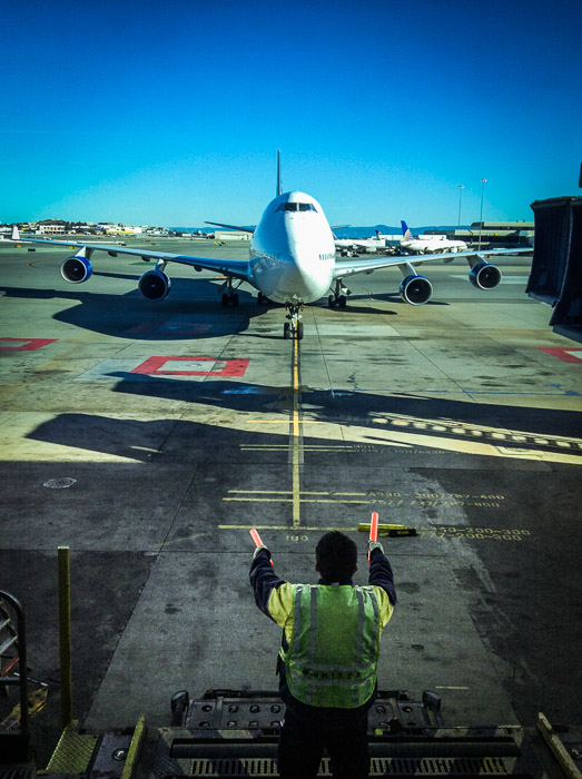 Easing In at San Francisco International Airport, Gate 100B -- Copyright 2014 Jeffrey Friedl, http://regex.info/blog/ -- This photo is licensed to the public under the Creative Commons Attribution-NonCommercial 4.0 International License http://creativecommons.org/licenses/by-nc/4.0/ (non-commercial use is freely allowed if proper attribution is given, including a link back to this page on http://regex.info/ when used online)