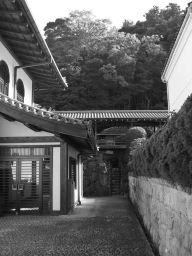 elevated walkway spanning a narrow stone stairwell, at the Nanzen Temple (Nanzenji) in Kyoto, Japan